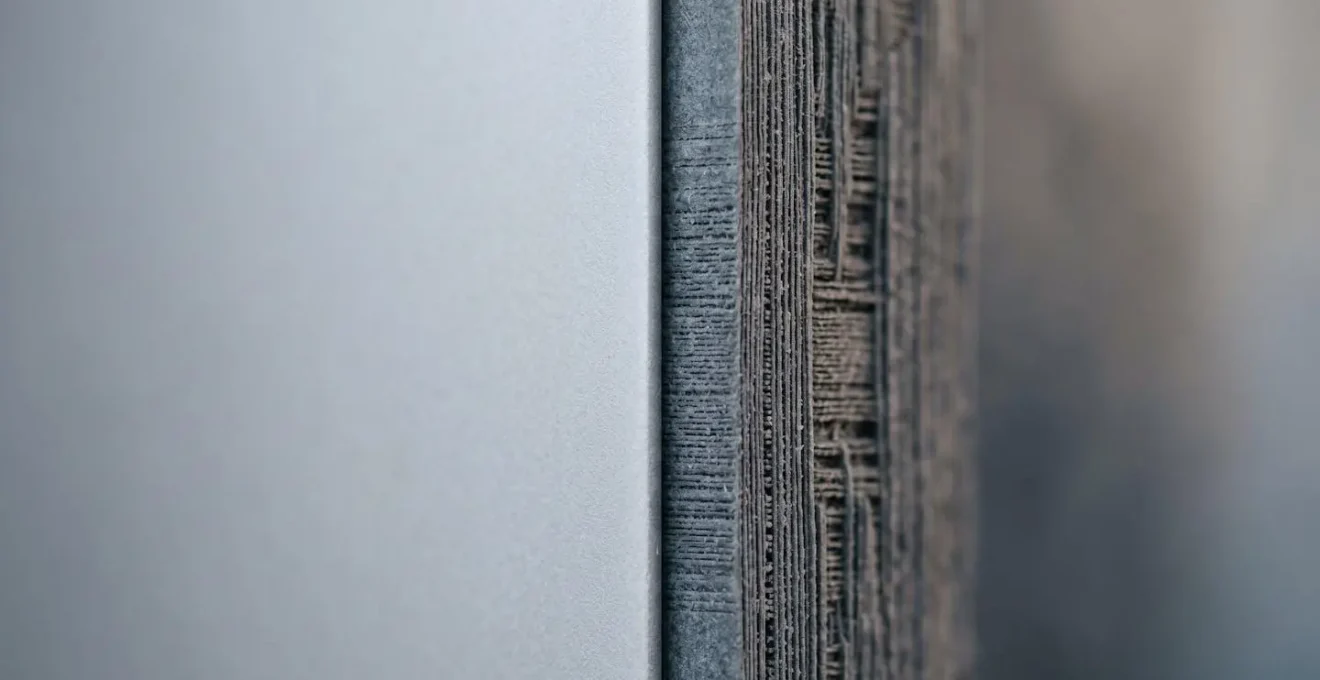 Close-up macro photograph showing textural contrast between minimal and comprehensive container base layers